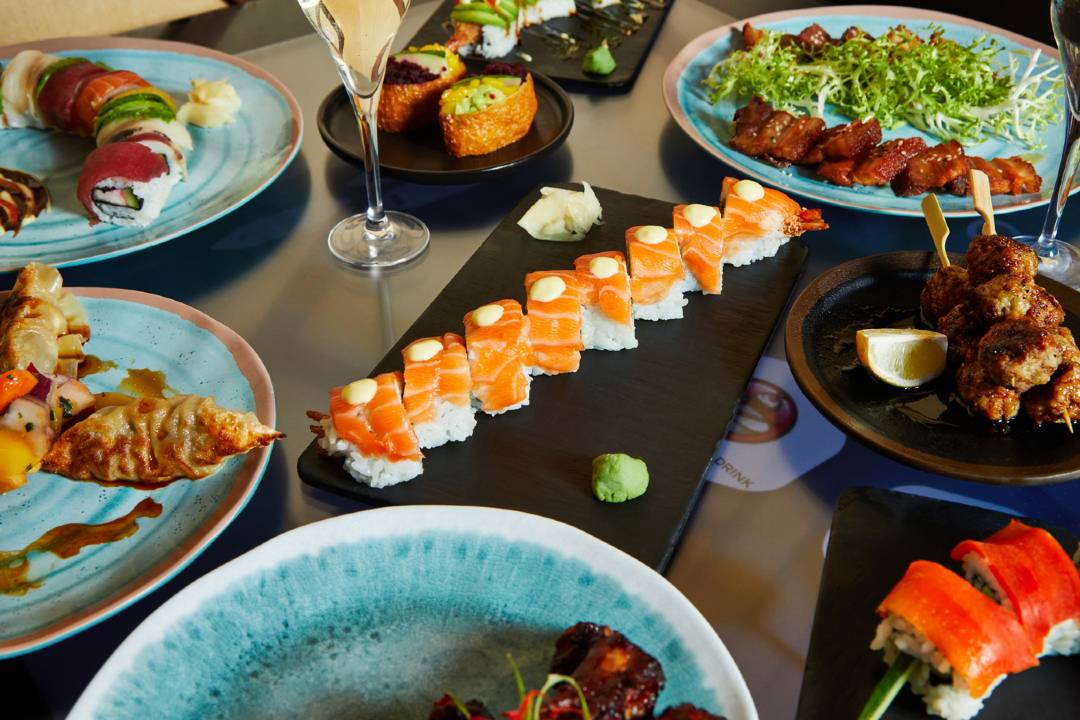 A photo showing a table with a selection of Asian tapas.